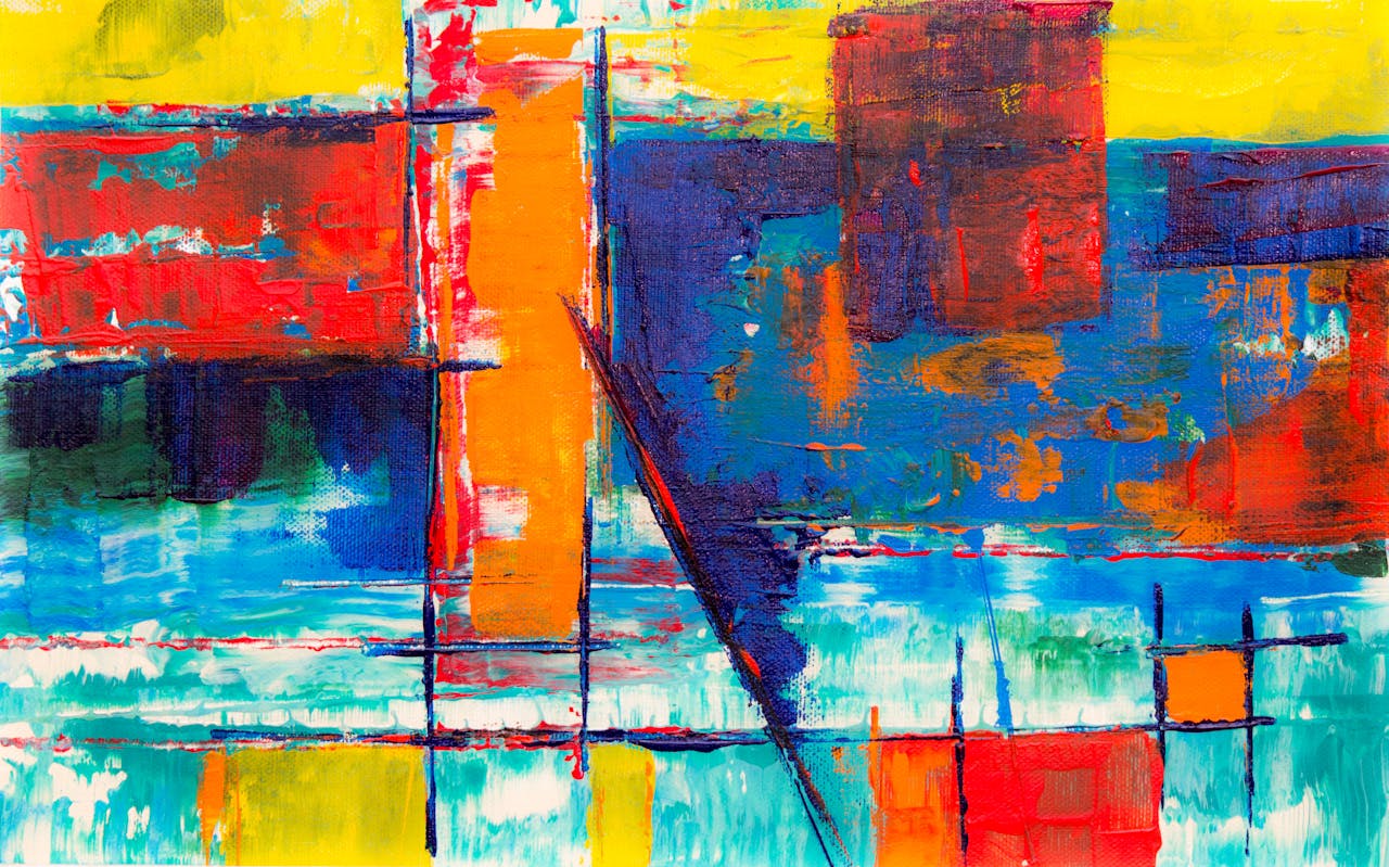 Colorful abstract art with geometric shapes and vibrant textures on canvas.