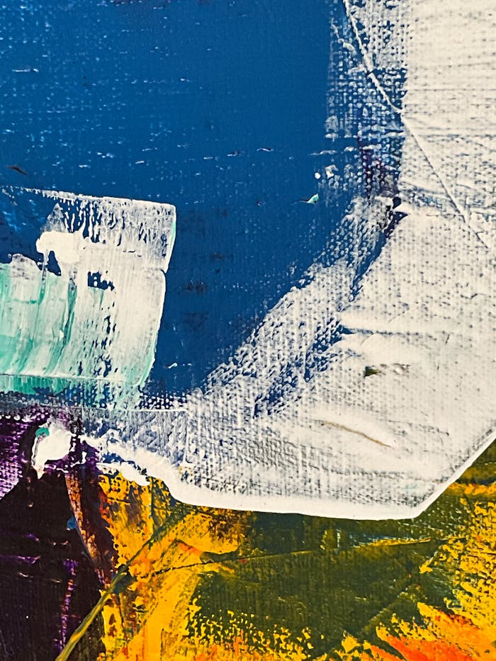 Vibrant abstract close-up of acrylic paints blending in a contemporary modern art style.