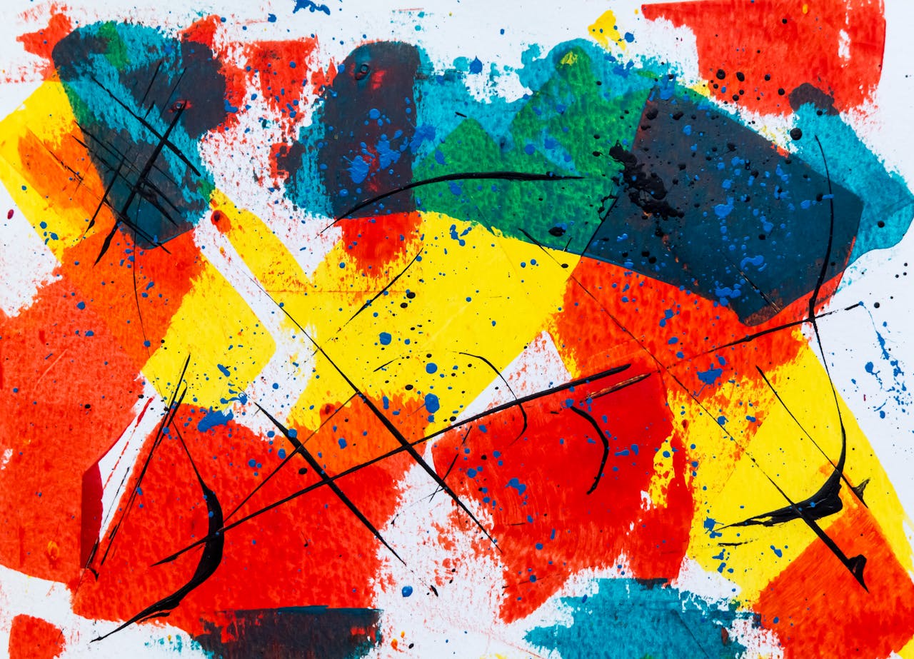 Dynamic abstract art with bold colors and expressive brush strokes on canvas.