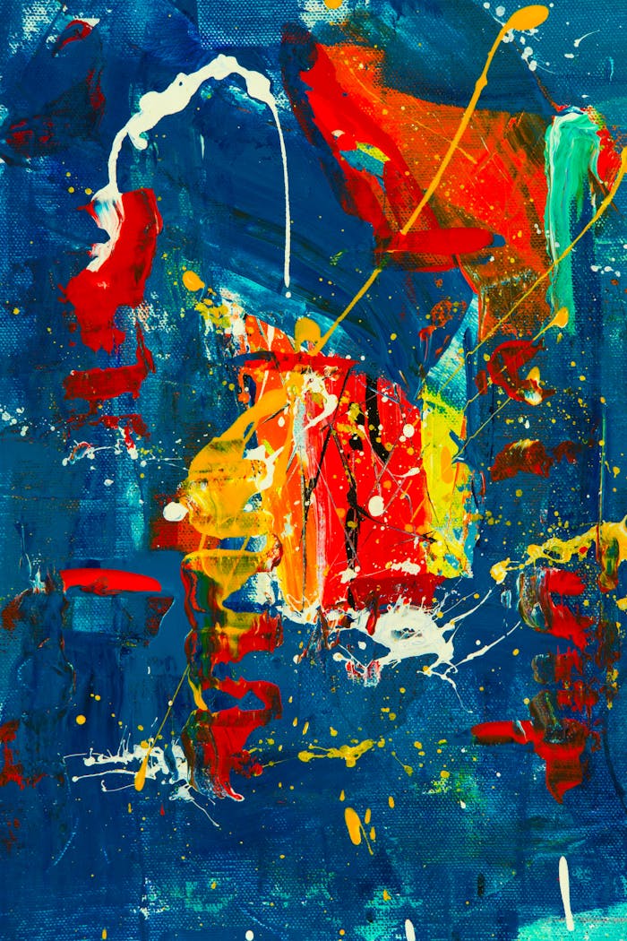 Colorful abstract painting with bold splashes and expressive strokes in a modern style.